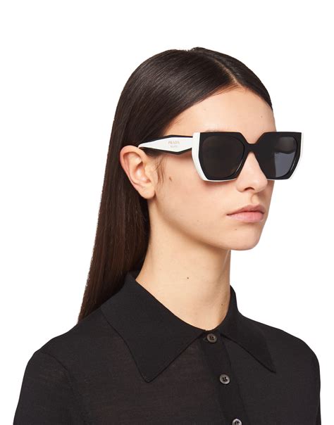 prada black sunglases|Prada black and white sunglasses.